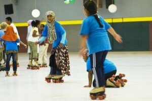 The Brian Coyle Community Center takes a field trip to the Roller Garden on Friday.