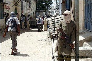 Armed Al-Shabaab fighters patrol Bakara Market in Mogadishu, Somalia, Monday, June 29, 2009. Somali radical Islamic insurgent says weapons and ammunition the United States recently supplied to Somalia's embattled government will only increase violence in the war-wracked country. Sheik Hassan Ya'qub, a spokesman for the militant group al-Shabab in the port town of Kismayo, was responding to an announcement by U.S. officials last week that the Obama administration had supplied arms and provided military training worth just under $10 million to the shaky official government. (AP Photo/Mohamed Sheikh Nor) (Mohamed Sheikh Nor - AP) 