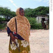 AP-Somali-soldier-stands-guard-near-Afgoye-in-the-south-of-Mogadishu-eng-210-22aug09