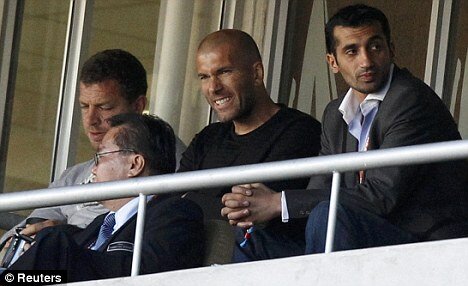 Famous face: World Cup winner Zinedine Zidane watches Algeria from the stands 